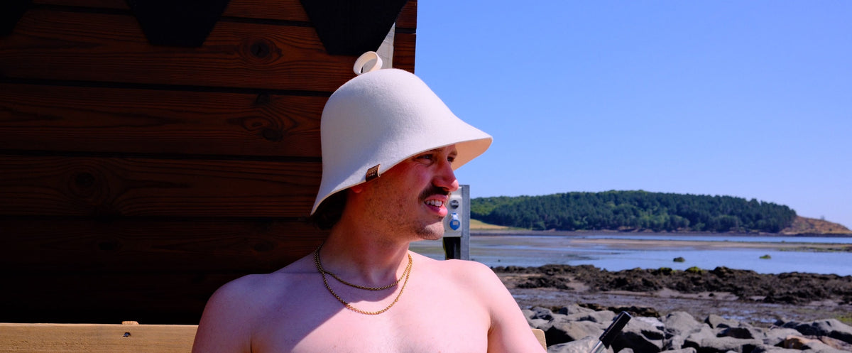 Why Wear a Hat in the Sauna? Sauna Hat Benefits Explained - sauna kind